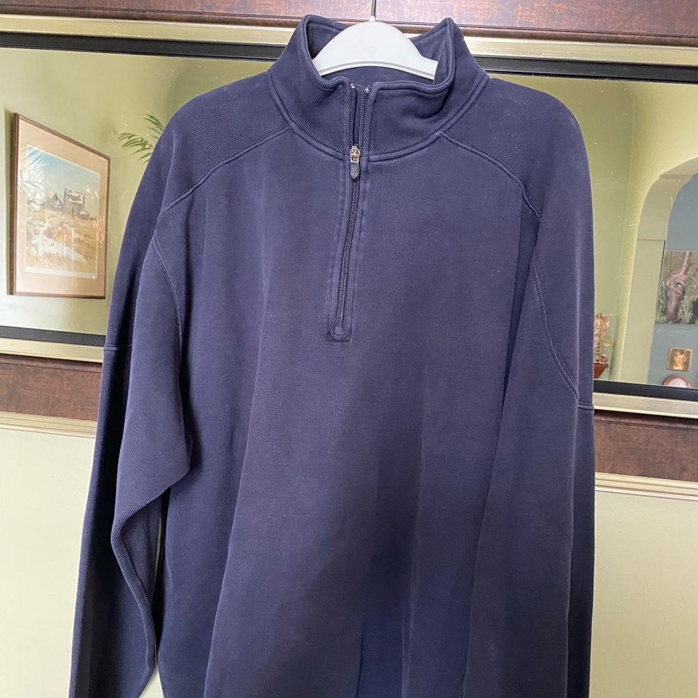 Cutter and Buck men’s “Cash For Life” 1/4 zip sweater.